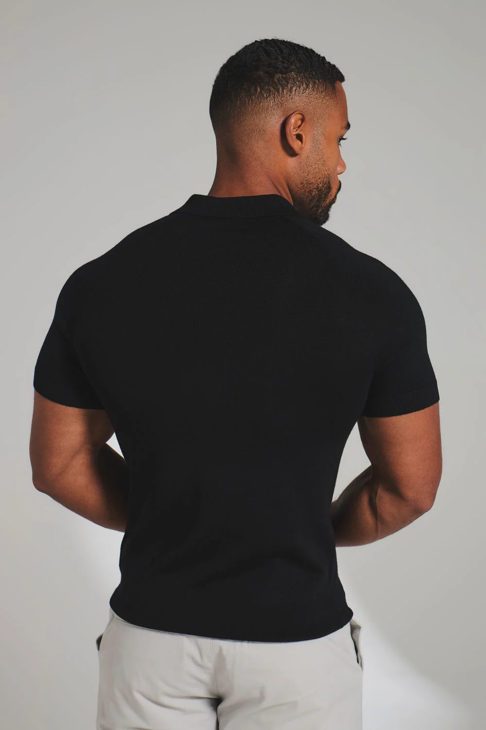 Extra Fine Merino Wool Knitted Open Collar Polo Shirt in Black - Image 6